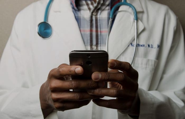 Healthcare professionals using AI to improve patient care and clinical operations